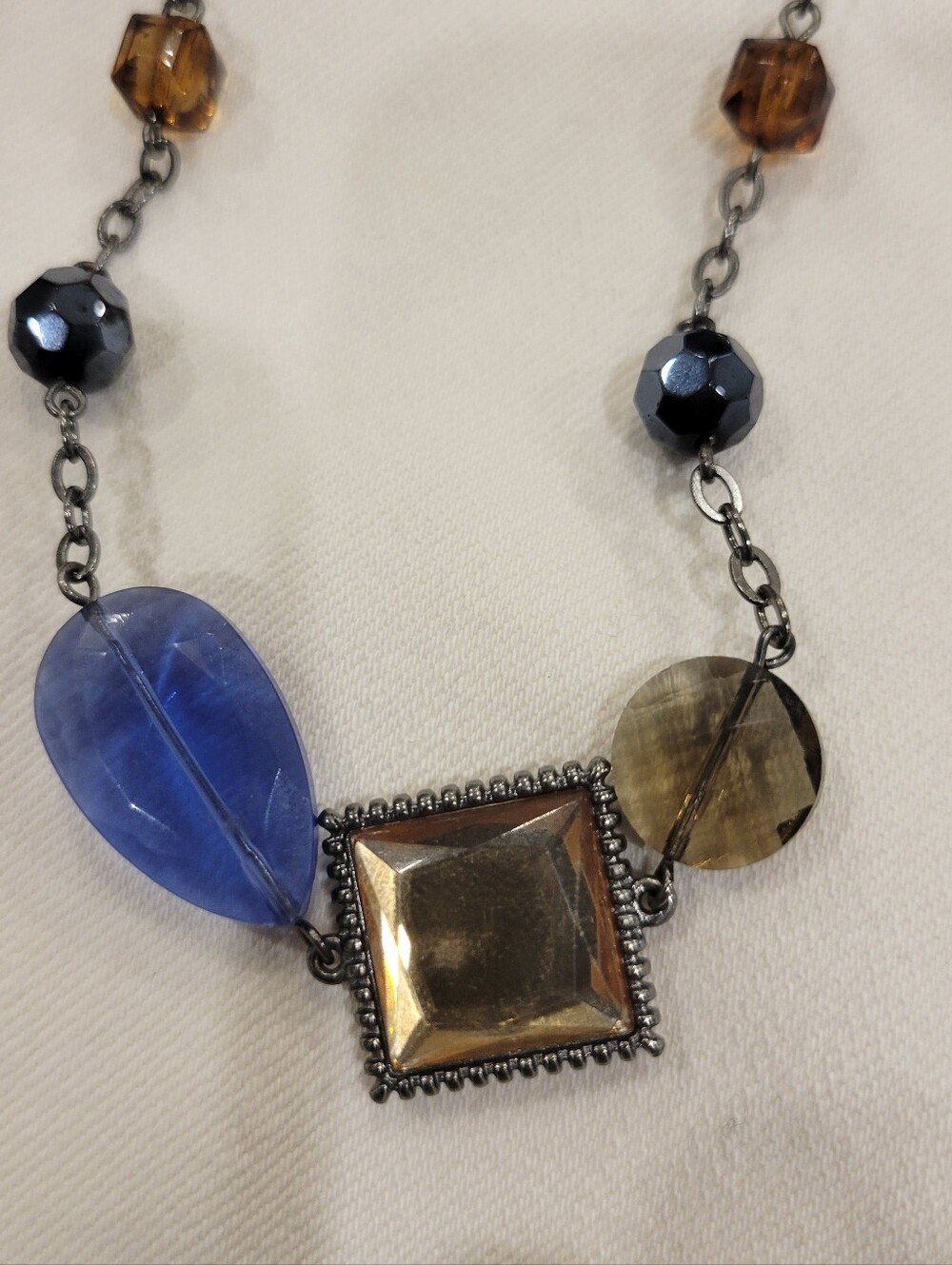 Lia Sophia Blue Teardrop Necklace with Gold Squares and Black Beads
